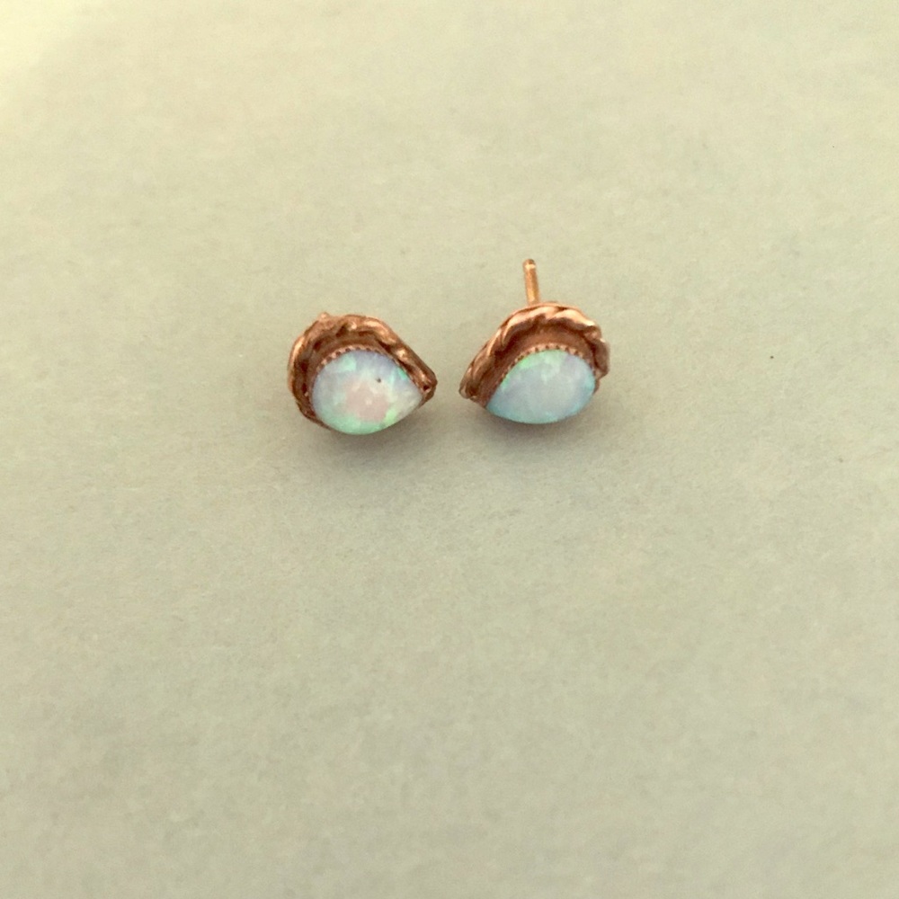 A pair of opal earrings